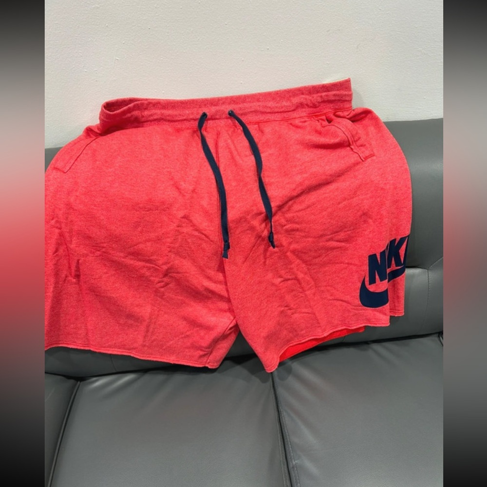 Nike Men's Athletic Red Shorts with Navy Nike swoosh Accents